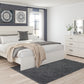 Stelsie King Panel Bed
