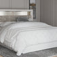 Altyra King Upholstered Panel Bookcase Headboard