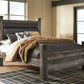 Wynnlow Queen Upholstered Poster Bed