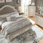 Realyn Queen Upholstered Bed